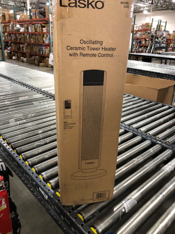 Photo 1 of Oscillating Ceramic Tower Heater with Logic Center Remote Control