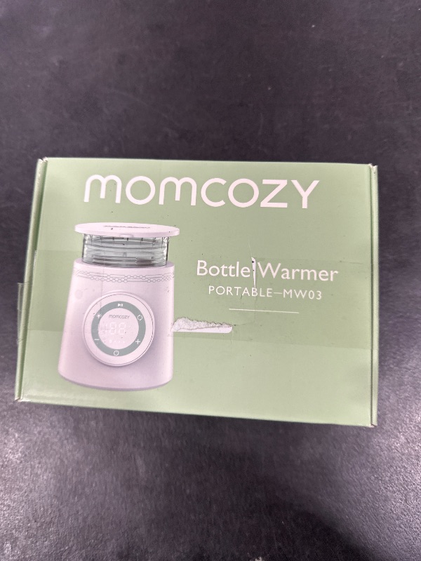 Photo 2 of Momcozy Travel-Friendly Portable Bottle Warmer with Rapid Heating & Leak-Proof Design, Safe for Multiple Brands Including Dr. Brown's, Philips Avent, Medela, Tommee Tippee, & Comotomo