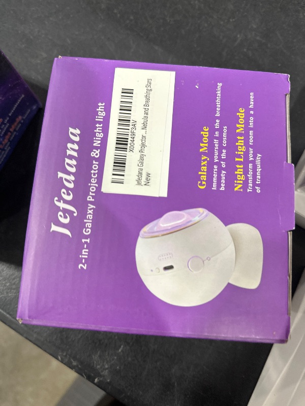 Photo 1 of Jefedana Mini Portable Galaxy Projector with Breathing Stars, Dynamic Nebula, Night Light Mode, Rechargeable Star Projector with Removable Base, Auto Spinning with Low Noise, Multicolor Light Effect