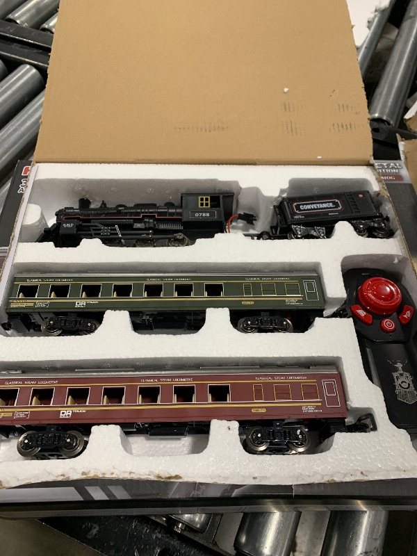 Photo 1 of Hot Bee Train Set, Remote Control Train Toys with Luxury Track & Glowing Passenger Carriages, Metal Christmas Tree Train with Smoke, Light and Sound, Toy Train Set for 3 4 5 6 7+ Years Old Boys Gifts