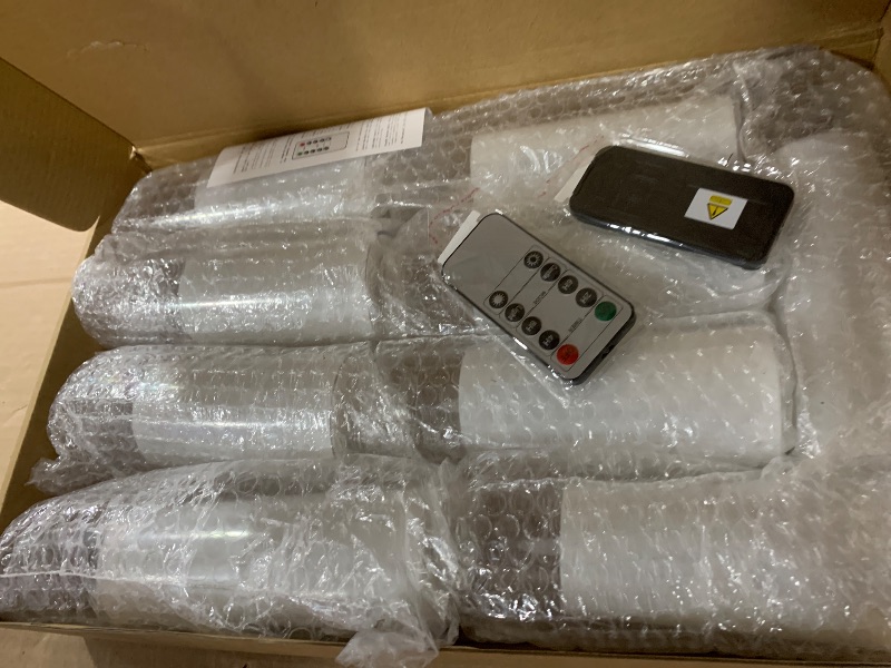 Photo 1 of kakoya Flickering Flameless Candles Battery Operated with Remote and 2/4/6/8 H Timer Plexiglass Led Pillar Candles Pack of 9 (D2.3"xH 5"6"7")with Realistic Moving Wick Candles for Home Decor(White)