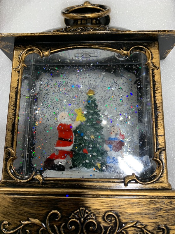 Photo 2 of 10.8'' Christmas Snow Globe Lantern USB Power Snowing Water Glitters Lighted Singing Snow Globe Lantern Christmas with 6H Timer, Musical LED Lighted Scene for Christmas Home Decoration (Santa Claus)