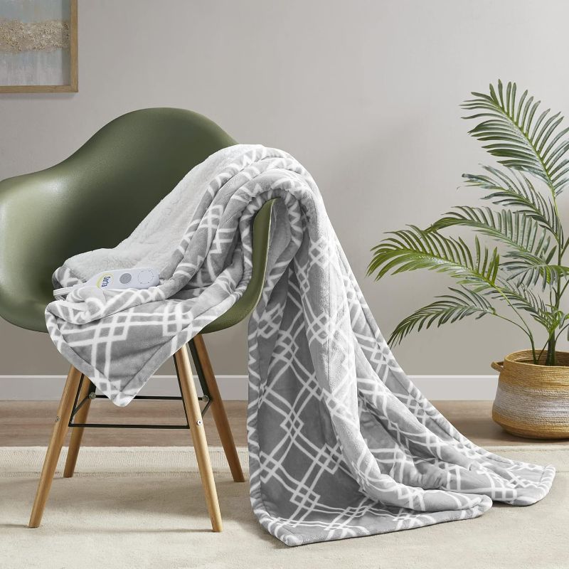 Photo 1 of ***POWERS ON BUT APPEARS TO NOT HEAT UP**
Serta Heated Throw Blanket - Reversible Fleece to Sherpa Electric Blanket, Fast Heating, Auto Shut Off Timer, Multi Heat Setting, ETL Certified, Machine Washable, Smoke Grey 50"x 60"