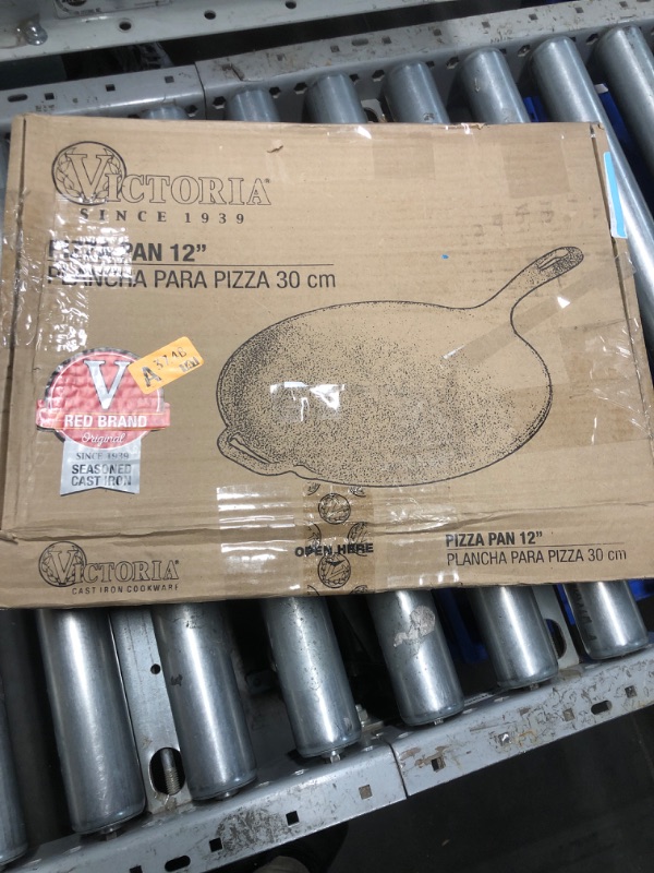 Photo 1 of Victoria 12-Inch Cast Iron Comal Pizza Pan with a Long Handle and a Loop Handle, Preseasoned with Flaxseed Oil, Made in Colombia