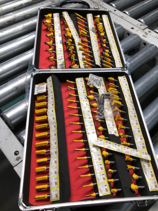 Photo 1 of *USED*EilxMag 100 Pieces Router Bit Set, Router Bits 1/4 Inch Shank with Aluminum Storage Case Tungsten Carbide Router Bits Kit for Professional Woodworking