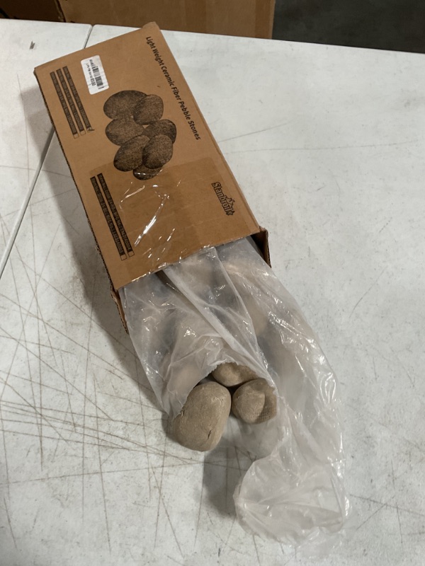 Photo 2 of ***SEE NOTES**
 Stanbroil 24pcs Light Weight Ceramic Fiber Pebble Stones for Indoor, Gas Inserts, Ventless, Vent Free, Electric, Outdoor Fireplaces and Fire Pits - Beige