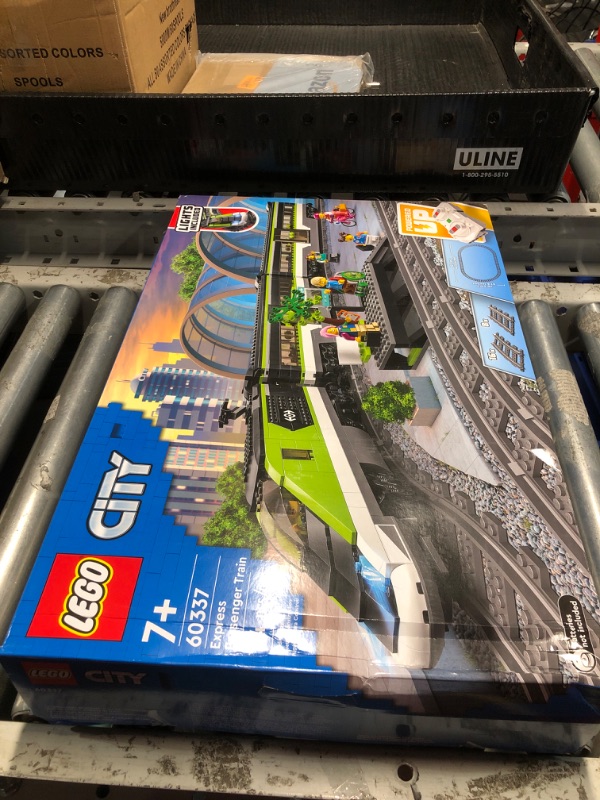 Photo 2 of (Used)
LEGO City Express Passenger Train Set, 60337 Remote Controlled Toy, Gifts for Kids, Boys & Girls with Working Headlights, 2 Coaches and 24 Track Pieces