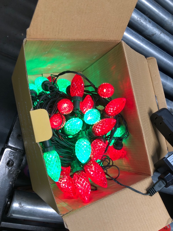 Photo 2 of **Missing 1 string***2-Pack Connectable C9 Christmas LED String Lights, Total 66 FT 100 LED Christmas Lights Plug in with 29V Safe Adapter, Waterproof Decorative Lights Indoor Outdoor for Xmas Decorations (Red and Green)