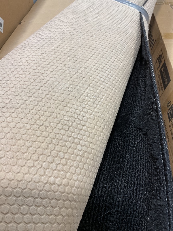 Photo 1 of **DIRT. MINOR USE WEAR**Garland Rug Sparta Non Slip Polypropylene 5 Ft. X 7 Ft. Black Area Rug- Ideal for Living Rooms & Hallways, Stylish & Durable for High-Traffic Areas