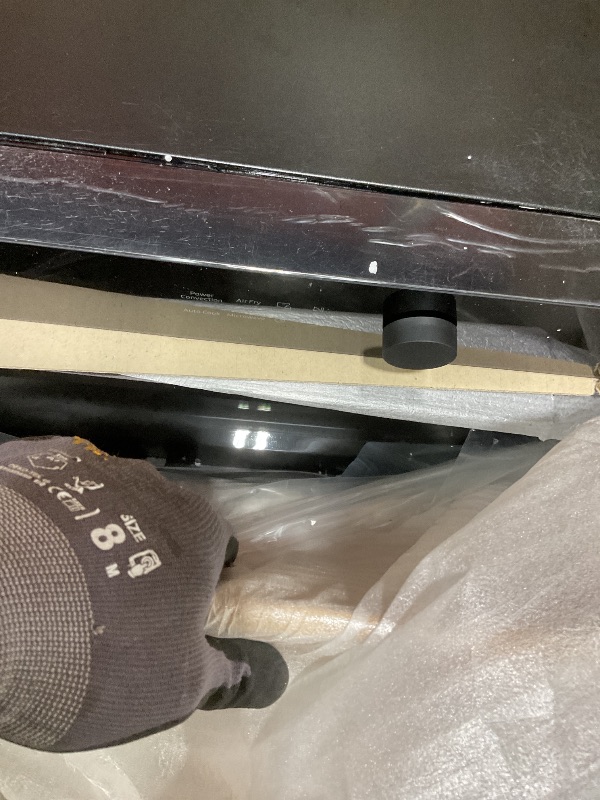 Photo 1 of **SCRATCHES ON TOP FROM TRANSPORT. CONTROL PANEL IS LOOSE**SAMSUNG 1.2 cu. ft. Countertop Convection Microwave with Air Fry, Black Glass, MC12DB8700CKAA