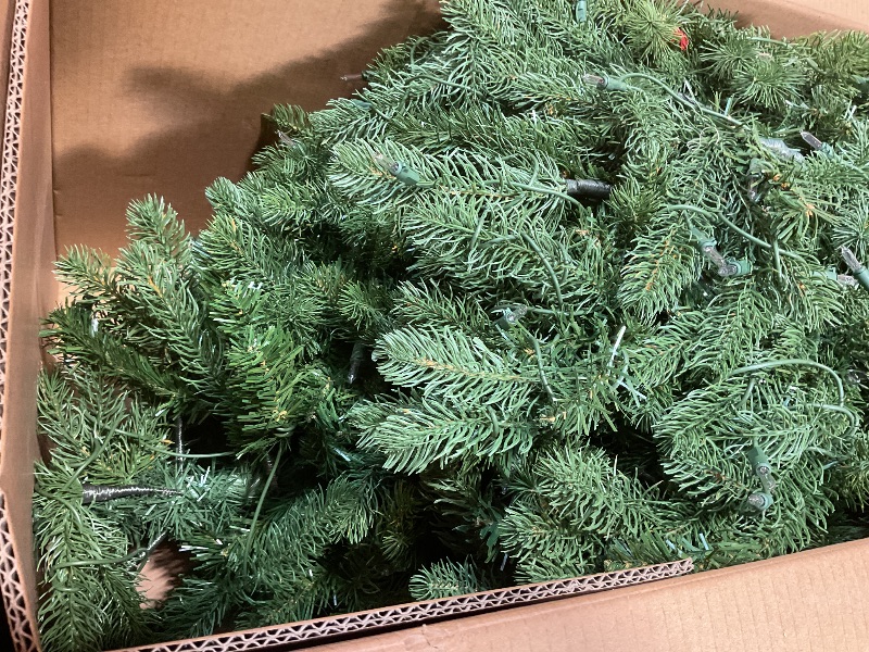 Photo 1 of **SCRAPES AND SCRATCH**National Tree Company 7.5 ft Pre-Lit Jersey Fraser Fir Full Artificial Christmas Tree, 1,250 Multicolor Lights, 3,144 Tips, Includes Stand, Green