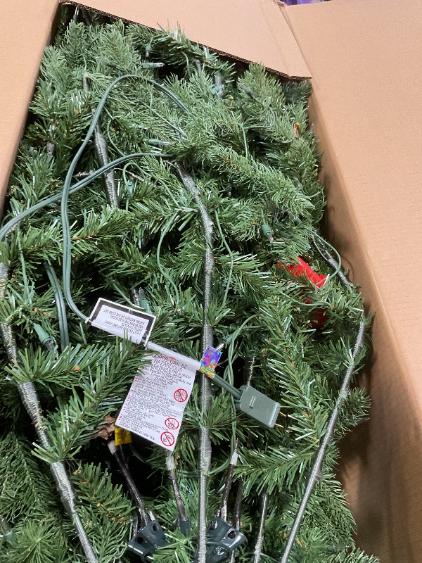 Photo 1 of **SCRAPES AND SCRATCH**National Tree Company 7.5 ft Pre-Lit Jersey Fraser Fir Full Artificial Christmas Tree, 1,250 Multicolor Lights, 3,144 Tips, Includes Stand, Green