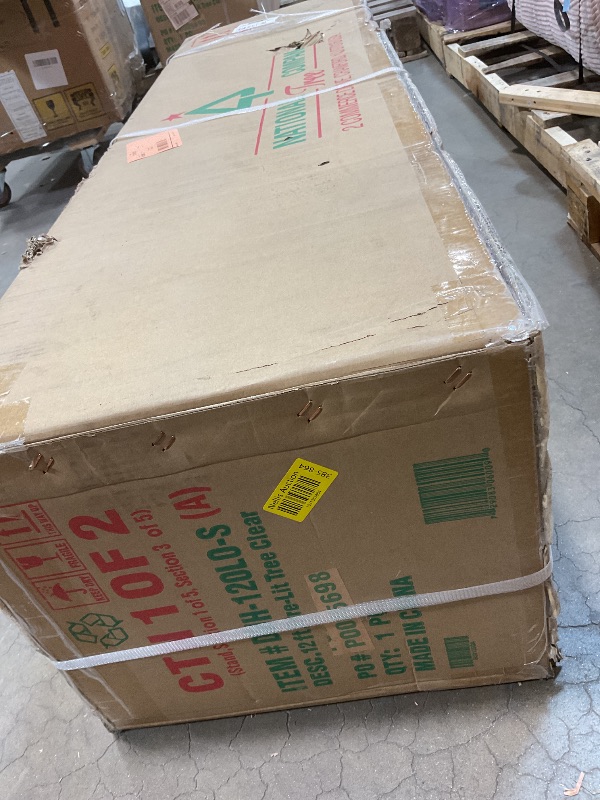 Photo 1 of **2 BOXES**National Tree Company 12 ft Pre-Lit Dunhill Fir Artificial Christmas Tree, 1,500 Clear Lights, 7,794 Tips, Includes Stand, Green