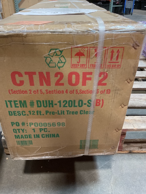 Photo 1 of **2 BOXES**National Tree Company 12 ft Pre-Lit Dunhill Fir Artificial Christmas Tree, 1,500 Clear Lights, 7,794 Tips, Includes Stand, Green