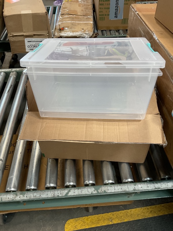 Photo 1 of **MAJOR DAMAGE** 2 clear bins 