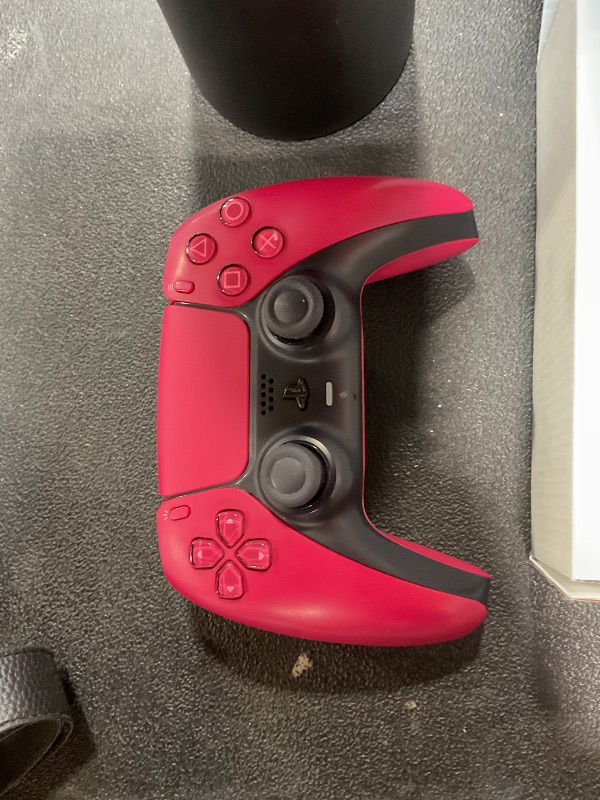 Photo 1 of ***RECOMENDED FOR PARTS ONLY/ DOESN'T HOLD CONSISTENT CHARGE*** PlayStation DualSense® Wireless Controller - Cosmic Red