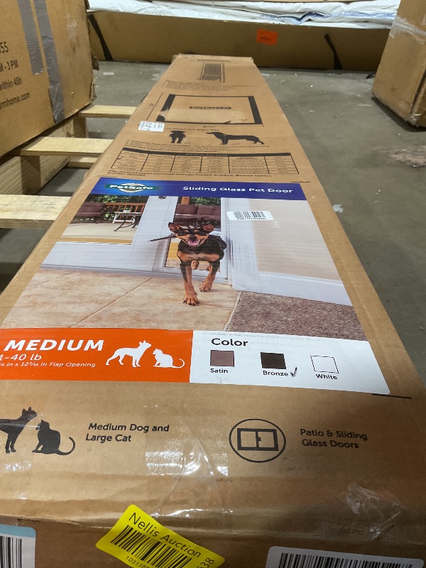 Photo 1 of **MISSING HARDWARE**PetSafe Sliding Glass Pet Door - No-Cut DIY Install Doggy Door for Renters - Aluminum Frame - Adjustable Height 75 7/8" to 80 11/16" - Ideal for Medium Dogs Up to 40 lb - Bronze