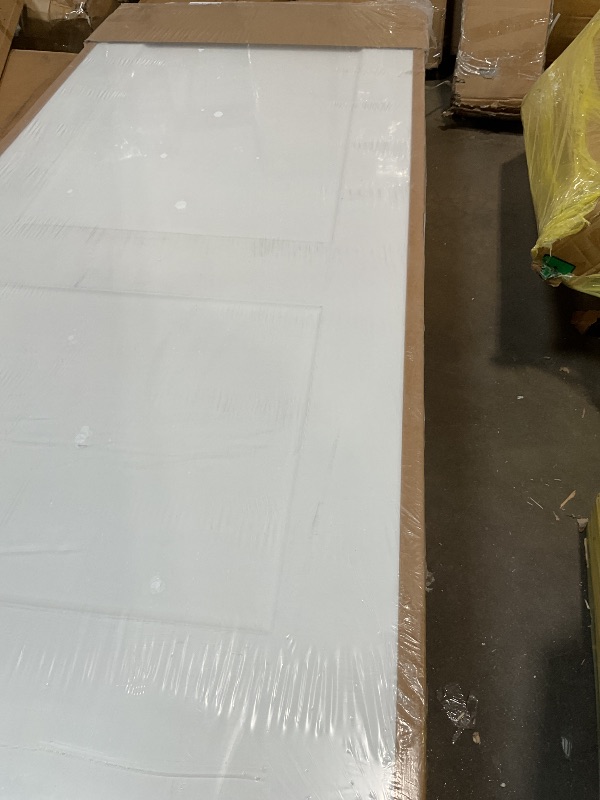 Photo 1 of **DOOR ONLY. PUNCTURE/SCRATCH DAMAGE**BarnSmith Concealed Sliding Barn Door, White Primed Flush Solid Core Sliding Hidden Barn Door with Soft Close Installation Hardware and Double Sided Pulls Included
36*84