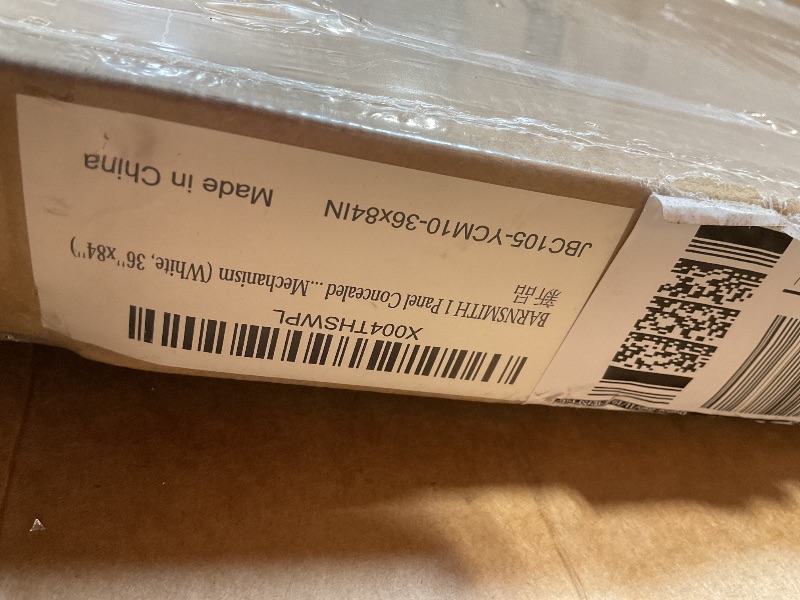 Photo 1 of **DOOR ONLY. PUNCTURE/SCRATCH DAMAGE**BarnSmith Concealed Sliding Barn Door, White Primed Flush Solid Core Sliding Hidden Barn Door with Soft Close Installation Hardware and Double Sided Pulls Included
36*84