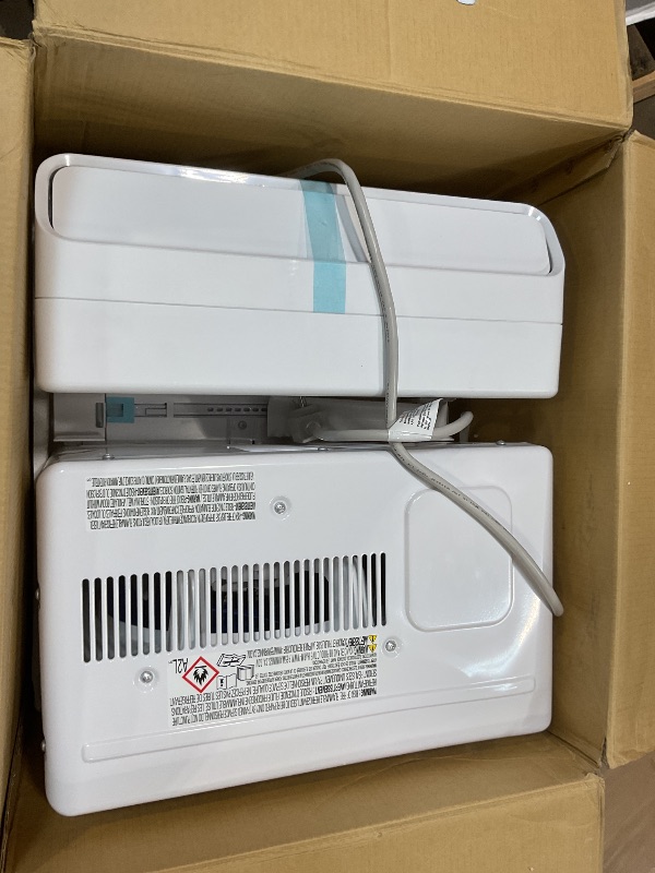 Photo 1 of **SELLING FOR PARTS. PLUG TURNED SIDEWAYS**Midea 12,000 BTU U Shaped Smart Inverter Window Air Conditioner - Cools 550 Sq Ft, Ultra Quiet with Open Window Flexibility - Alexa/Google Assistant Compatible - 35% Energy Savings, Remote (Updated)