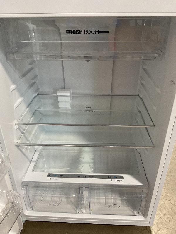 Photo 1 of *** MINOR DAMAGE***BLACK+DECKER 16.4 Cu. Ft. Top Mount Refrigerator with Freezer, 2 Door Refrigerator with Top Freezer and Separate Temperature Controls, Auto Defrost, BR1640KW, White