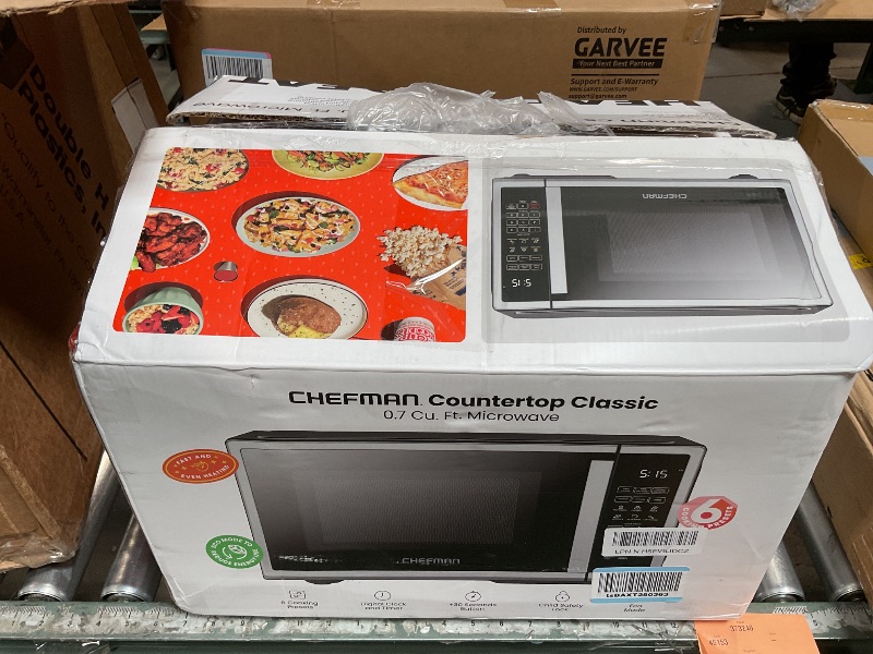 Photo 1 of *** FOR PARTS ONLY /DAMAGED FROM BEING DROPPED*** Chefman Countertop Microwave Oven 0.7 Cu. Ft. Digital Stainless Steel Microwave 700 Watts with 6 Auto Menus, 10 Power Levels, Eco Mode, Memory, Mute Function, Child Safety Lock, Easy Clean