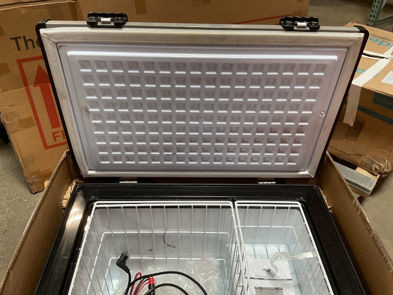 Photo 1 of *** USED/MAJOR DAMAGE***Whynter FM-65G 65 Quart Portable Refrigerator and Deep, AC 110V/ DC 12V, Real Chest Freezer for Car, Home, Camping, and RV with-8°F to 50°F Temperature Range, Gray, One Size
