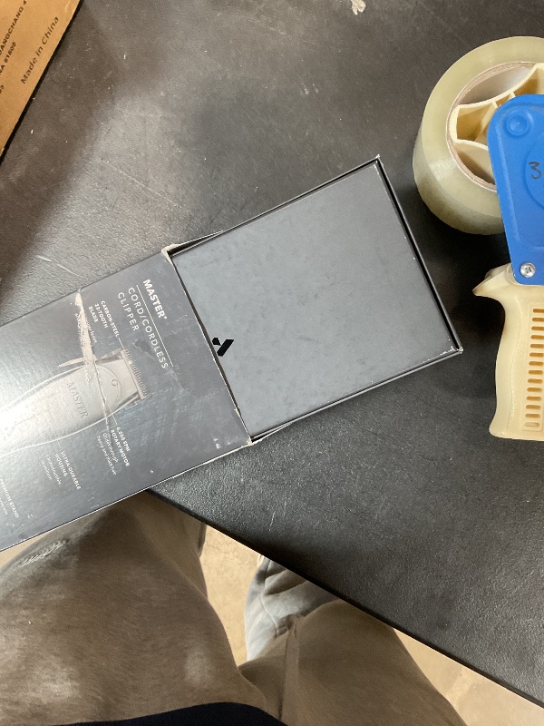 Photo 1 of **HEAVILY USED** Andis 12660 Professional Master Corded/Cordless Hair Clipper, Adjustable Carbon Steel Blade Hair Clipper for Close Cutting, Silver