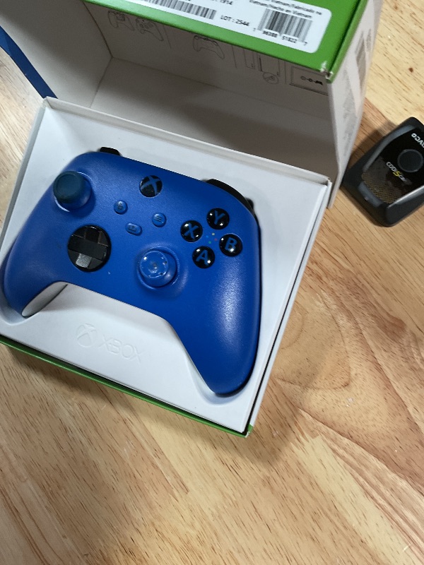 Photo 1 of **POSSIBLY FOR PARTS/ HEAVILY USED/ ISSUES FUNCTIONING*** Xbox Wireless Gaming Controller | Shock Blue | Console, PC, & Android | Textured Grip | Wireless, Bluetooth, USB-C Connectivity