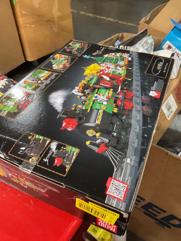 Photo 1 of Mould King Christmas Train Building Set for 8+ Years Old Kids and Adults, Christmas Toy Train with Smokes, Lights and Sound, Electric Model Trains with Steam Locomotive, Carriages and Tracks, 12012