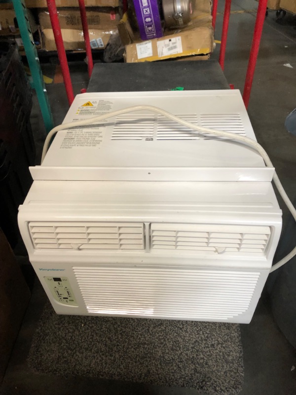 Photo 2 of ***USED - MAJOR DAMAGE - DENTED - NO PACKAGING - MISSING ACCESSORIES - SEE PICTURES - UNABLE TO TEST***
Keystone 12,000 BTU Window Air Conditioner with Dehumidifier and Supplemental Heat, 230V, Window AC for Medium Rooms up to 550 Sq. Ft. with Remote Cont