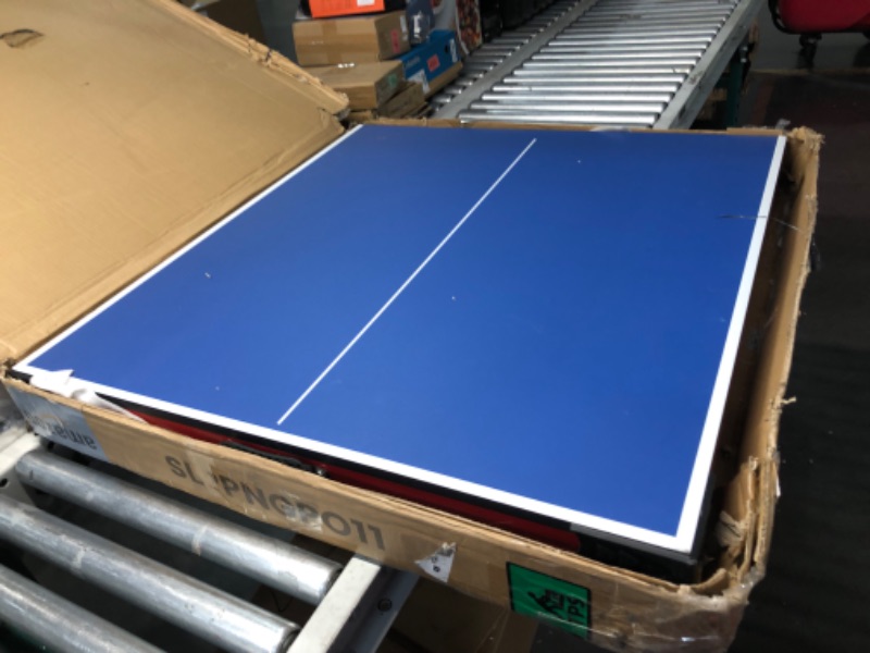 Photo 5 of ***USED - MAJOR DAMAGE - SEE PICTURES - TABLE ONLY - MISSING PARTS***
SereneLife Midsize Portable Ping Pong Table Set with Net, Clipper, Post, 2 Paddles, 3 Balls - 6’ x 3’ Foldable Space-Saving Design