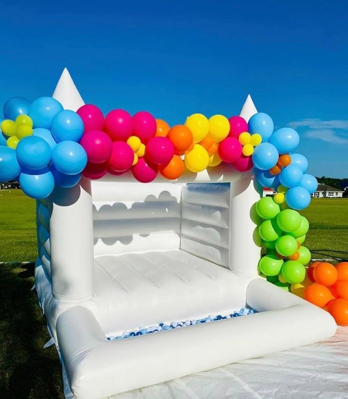 Photo 1 of ***STOCK PHOTO REFERENCE ONLY***White Bounce House for Adults Kids, 13.5FT PVC Commercial Grade Bounce House for Kids 5-12 with 750W Powerul Blower, Inflatable Large Bounce House Wedding Birthday Party Decorations 13.5 x 11.5 x 10FT