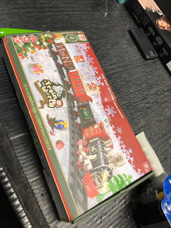 Photo 1 of JUQU Train Set, Christmas Train Set for Around The Tree w/Lights & Xmas Sounds, Christmas Tree Train Toys, Electric Toy Train Set for Boys, Toddler Model Train Gifts for 3 4 5 6 7 8+ Years Old Kids