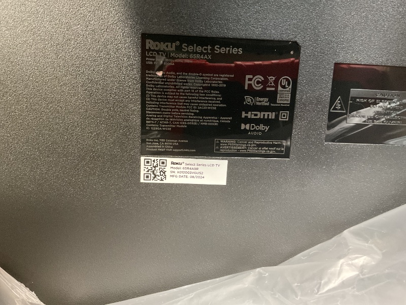 Photo 1 of Roku Smart TV – 65-Inch Select Series 4K HDR RokuTV with Roku Enhanced Voice Remote, Brilliant 4K Picture, Automatic Brightness, & Seamless Streaming – Live Local News, Sports, Family Entertainment this item was still in the factory seal when I opened it 