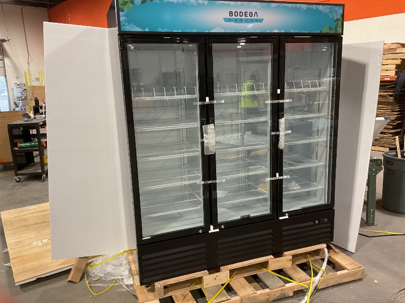 Photo 2 of BODEGACOOLER Commercial Merchandiser Refrigerator,3 Glass Door Commercial Beverage Refrigerator, Beverage Display Cooler with Soft LED Light, Adjustable Shelves and 8 Strong Castors, 53 Cu. Ft,Black This item was in the original factory crate and does app