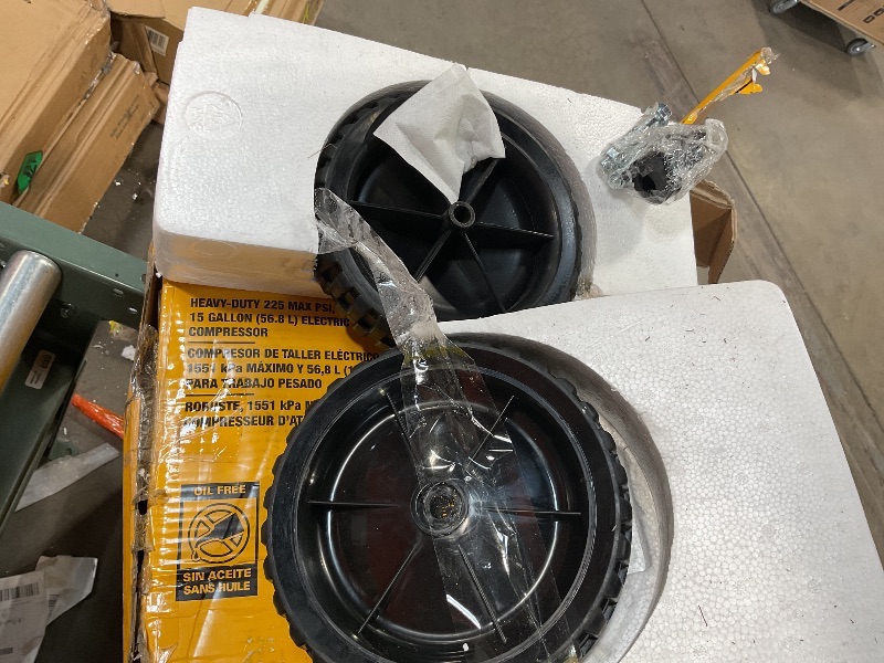 Photo 3 of DEWALT 15 Gal. 200 PSI Portable Electric Air Compressor  This item seem to bear in the oringina factory seal new and unused are parts were found ion box as pictured