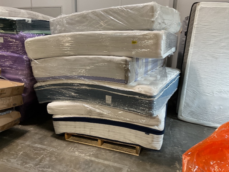 Photo 1 of I have a stack, of mattress, 1king, 2 fulls, and three queens ,dirty, in shipping