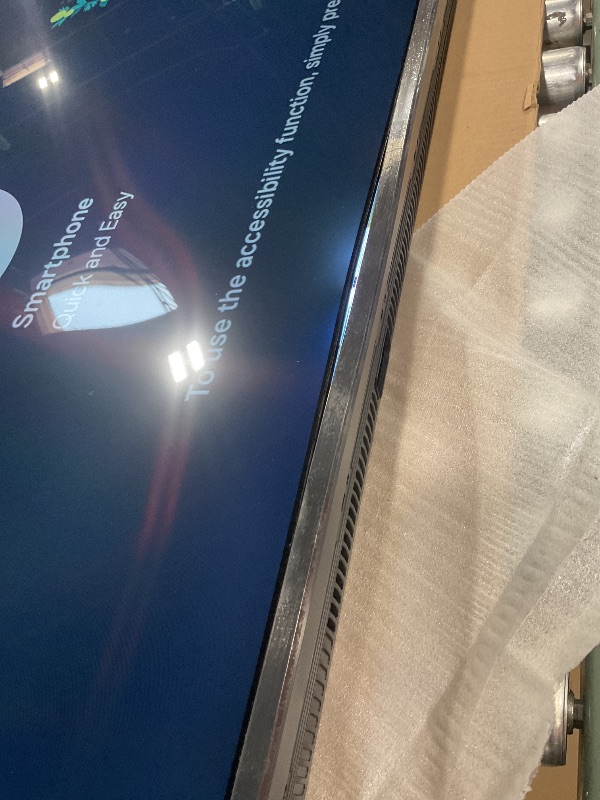 Photo 1 of SAMSUNG 65-Inch Class Crystal UHD 4K DU7200 Series HDR Smart TV w/Object Tracking Sound Lite, PurColor, Motion Xcelerator, Mega Contrast, Q-Symphony (UN65DU7200, 2024 Model) *MINOR DAMAGE - BOTTOM OF SCREEN/PANEL - POWERS ON/FUNCTIONAL - SEE PICS*