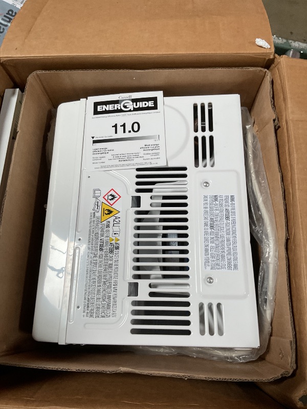 Photo 1 of **DAMAGED/DENT**VERY LOUD NOISE** 
Amazon Basics 5000-BTU Window Air Conditioner with Quiet Operation, Up to 150 Sqf, Cool and Fan Functions, Washable Filter, Adjustable Window Kit, Intuitive Mechanical Controls, for Small Room, White