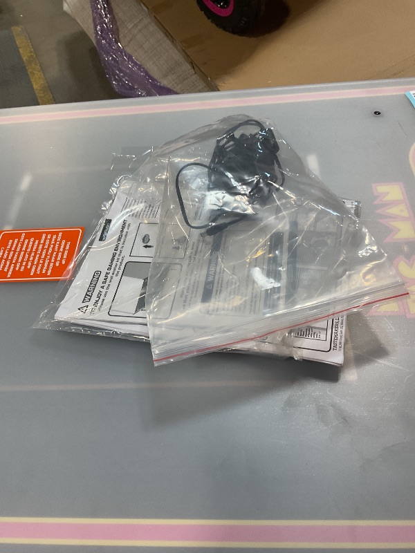 Photo 1 of ***UNTESTED AND PARTS MAYBE NEEDED FOR INSIDE*** Arcade1Up Ms.PAC-Man Head-to-Head Arcade Machine – Retro Home Arcade Table with 12 Classic Games, Light-Up Control Deck & Real-Feel Joysticks