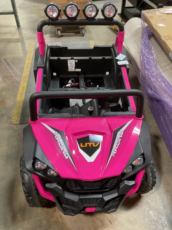 Photo 1 of ***MISSING REMOTE AND SHORT IN WIRING*** ELEMARA 2 Seater 24V Ride on Toys for Big Kids,Electric Car for Kids w/Parent Remote Control,Heavy-Duty Electric Ride On Truck w/ 4-Wheeler Suspension,5 Mph Max Speed,Bluetooth,Rainbowlight*4,Pink