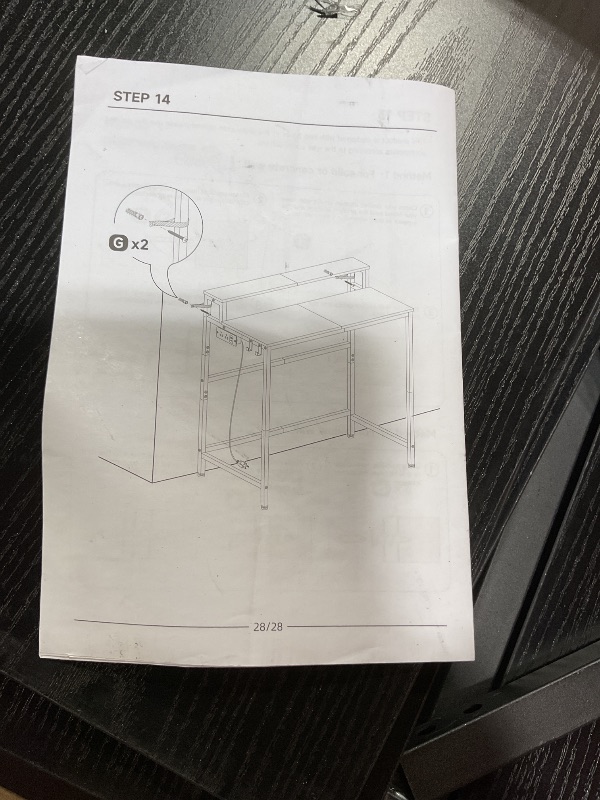 Photo 1 of ***HARDWARE  LOOSE IN PACKAGE*** YATINEY Small Computer Desk with Charging Station and LED Lights, Gaming Desk with Monitor Stand, 2-Tier Home Office Desk with 4 Side Hooks, for Living Room, Home Office, Black DN01UDBBY2