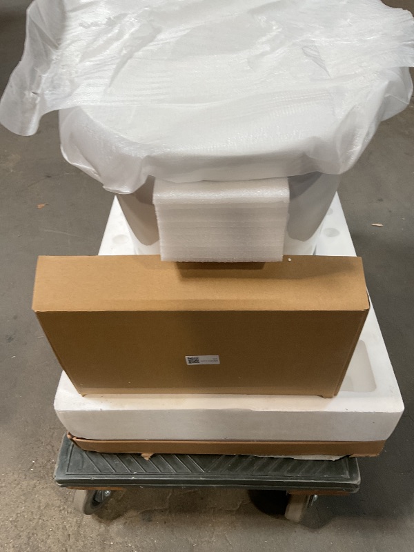 Photo 1 of *** MINOR DAMAGE ***WOODBRIDGE Smart Toilet, Auto Open & Close, Auto Flush, Foot Sensor, Cleaning Foam Dispenser, Heated Seat and Chair Height Design, EBT230