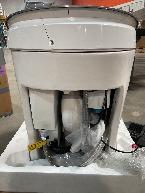 Photo 1 of *** MINOR DAMAGE ***WOODBRIDGE Smart Toilet, Auto Open & Close, Auto Flush, Foot Sensor, Cleaning Foam Dispenser, Heated Seat and Chair Height Design, EBT230