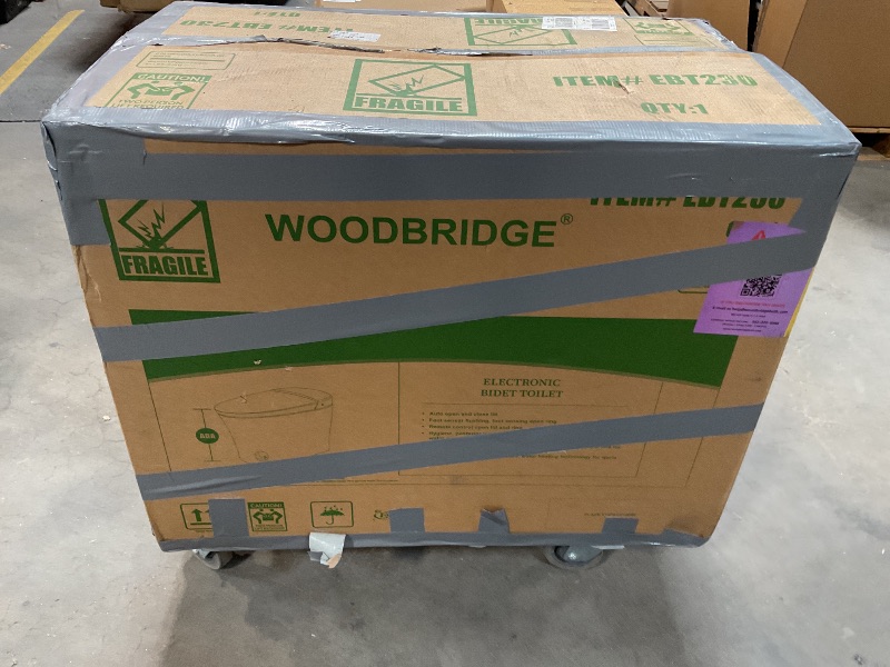 Photo 1 of *** MINOR DAMAGE ***WOODBRIDGE Smart Toilet, Auto Open & Close, Auto Flush, Foot Sensor, Cleaning Foam Dispenser, Heated Seat and Chair Height Design, EBT230