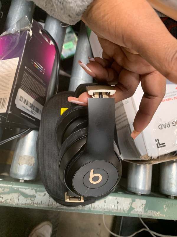 Photo 1 of **ONE EAR DOESNT WORK** Beats Solo 4 - Wireless On-Ear Bluetooth Headphones, Up to 50-Hour Battery Life, Ultra-Lightweight Comfort, Powerful and Balanced Sound, Apple & Android Compatible - Black & Gold
