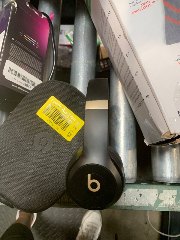 Photo 1 of **ONE EAR DOESNT WORK** Beats Solo 4 - Wireless On-Ear Bluetooth Headphones, Up to 50-Hour Battery Life, Ultra-Lightweight Comfort, Powerful and Balanced Sound, Apple & Android Compatible - Black & Gold