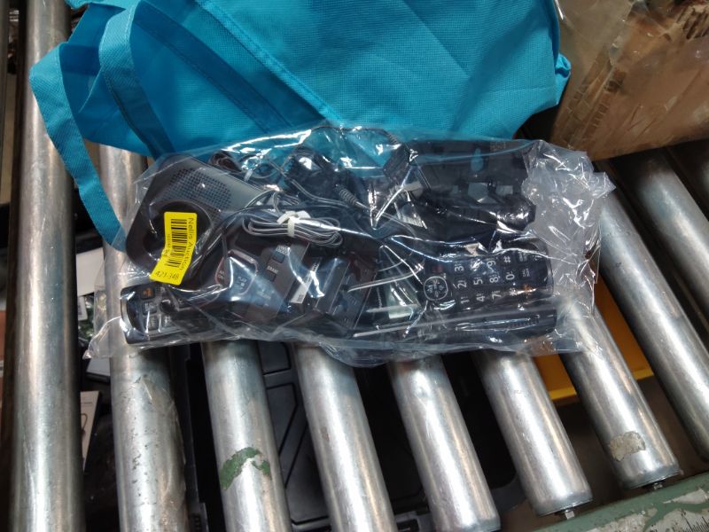 Photo 1 of ***RECOMENDED FOR PARTS FUNCTIONAL BUT ONLY PUT OUT STATIC CANNOT DIAL OUT ANY NUMBERS **** Panasonic DECT 6.0 Expandable System, Cordless Phones With Answering Machine and Call Blocking - 3 Cordless Phones 3 Handsets - KX-TGE633M (Metallic Black)