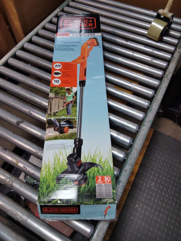 Photo 1 of ***FOR PARTS ONLY DIRTY AND DAMAGED *** BLACK+DECKER 20V MAX Weed Wacker Cordless String Trimmer Edger Lawn Tool, 10-Inch Electric Weed Eater with Automatic Feed Spool, Ergonomic, Battery and Charger Included (LST201)